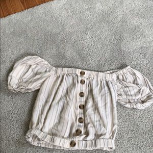 Black and cream off the shoulder crop top